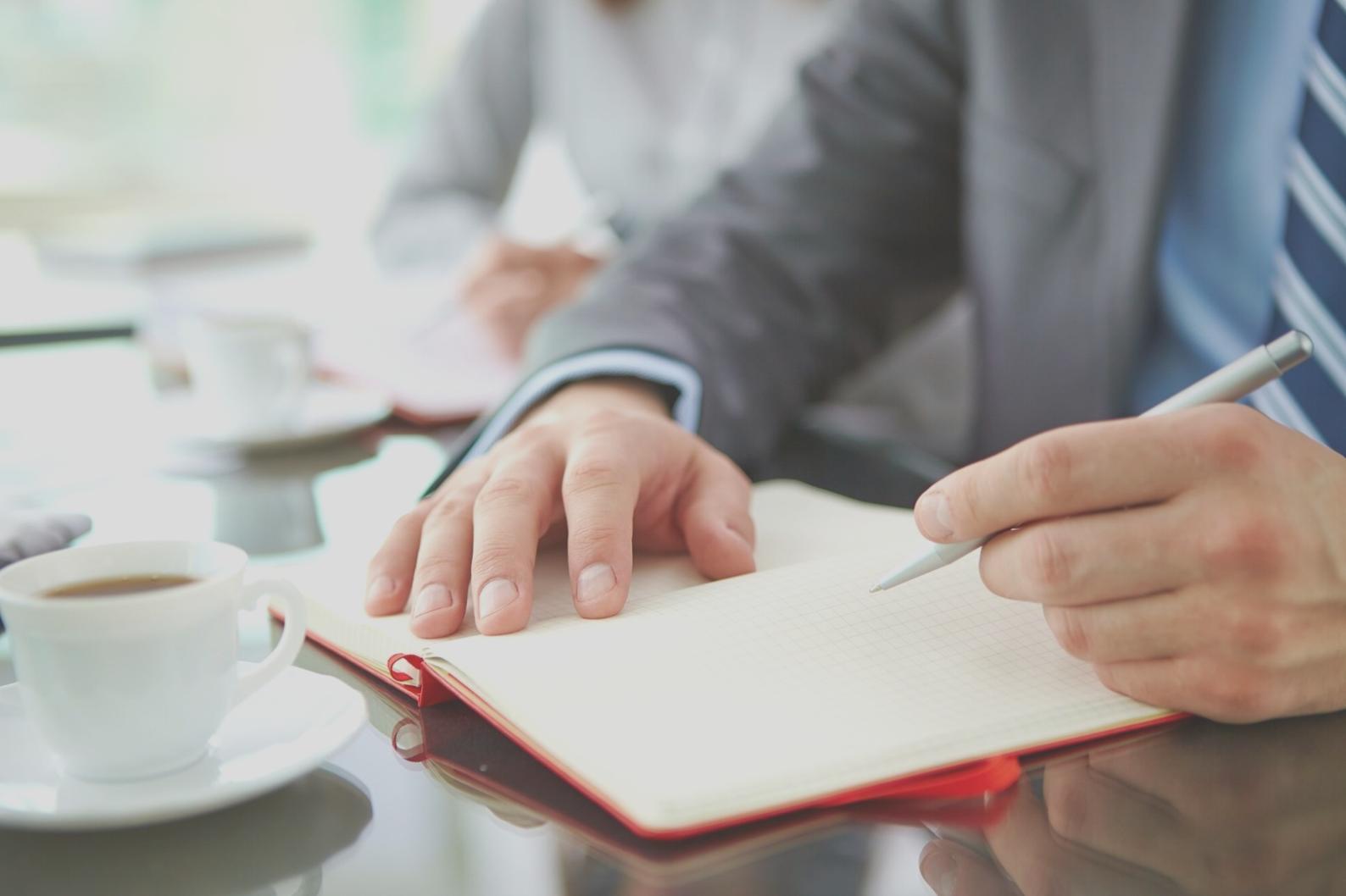 Executive presenting financial data to board members